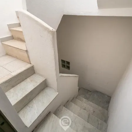73 E 74 - 74 *